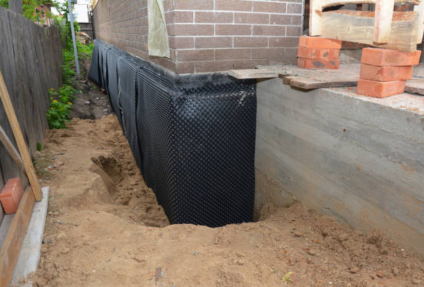 SJ Waterproofing Pros technician performing targeted Vapor Barrier Installation assessment in Washburn, TN